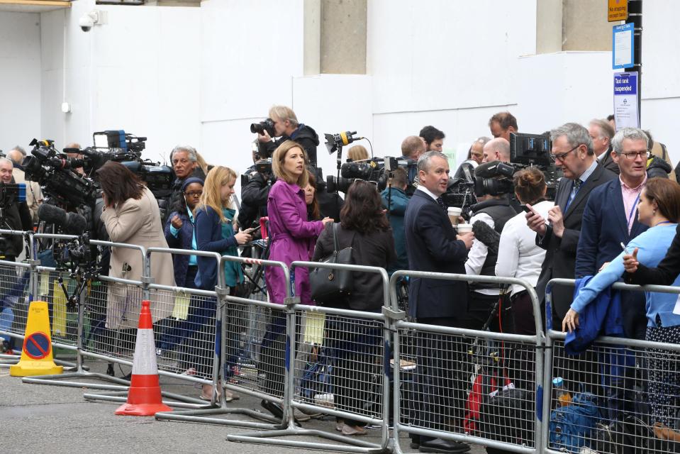  The couple were confronted by a wall of TV cameras and press photographers