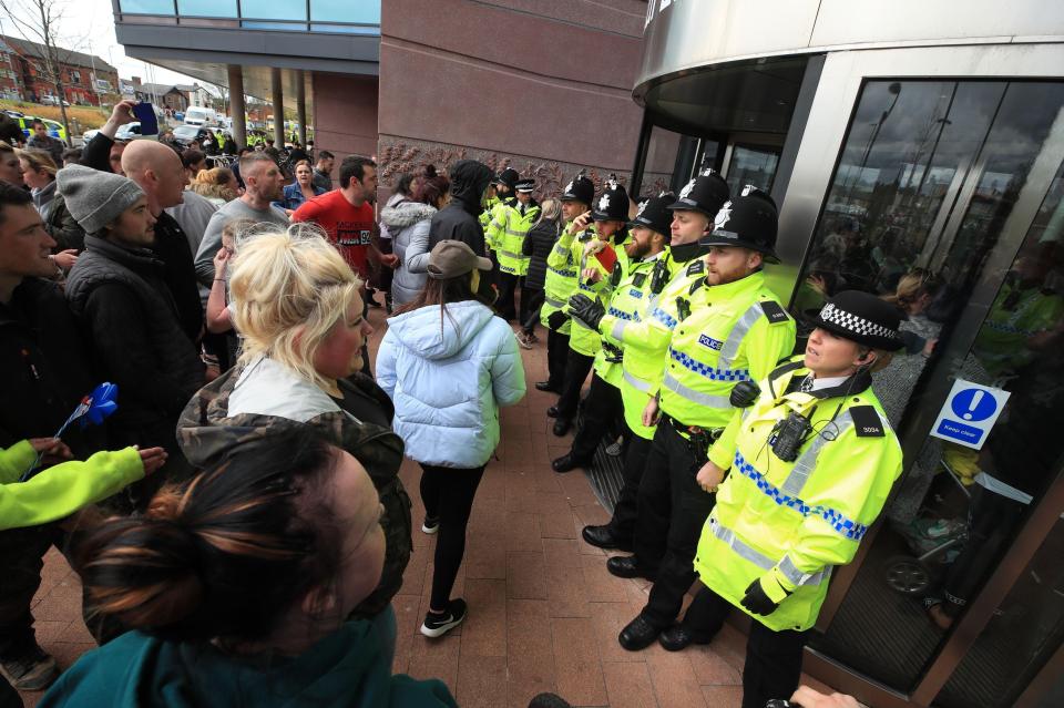  Dozens of police were on guard to keep protesters from storming Alder Hey Hospital