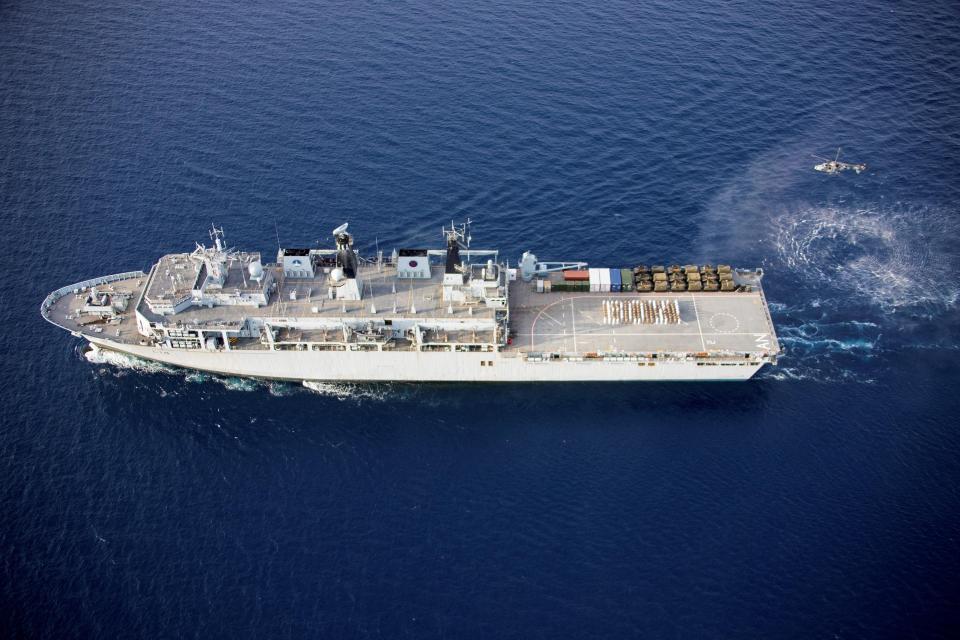  Members of the crew of HMS Albion form the word "Boy!" on the flight deck to celebrate the birth