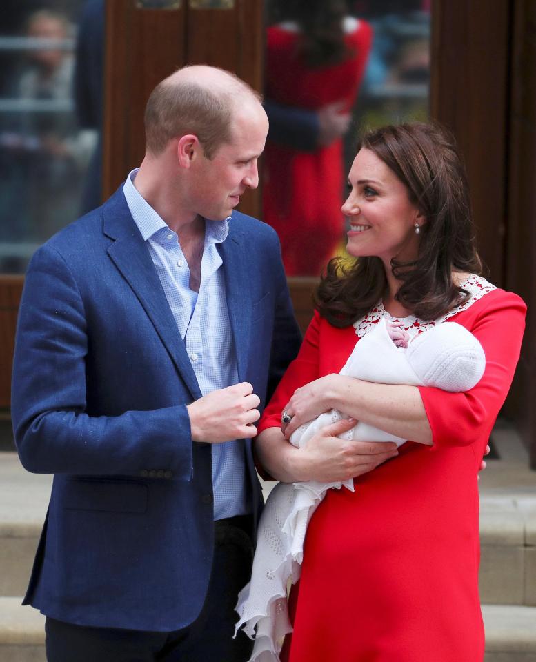  William and Kate share a loving glance as the country meets their third child