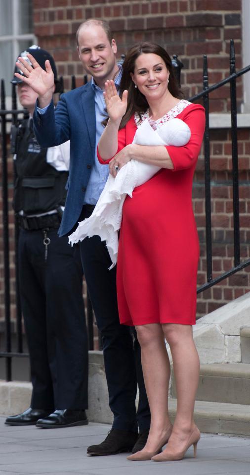  William and Kate wave to crowds of well-wishers after introducing their baby boy to the country