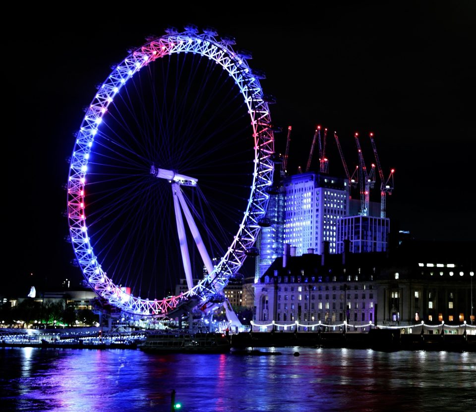  London's landmarks like the Eye were lit up in red, white and blue to celebrate the royal birth last night