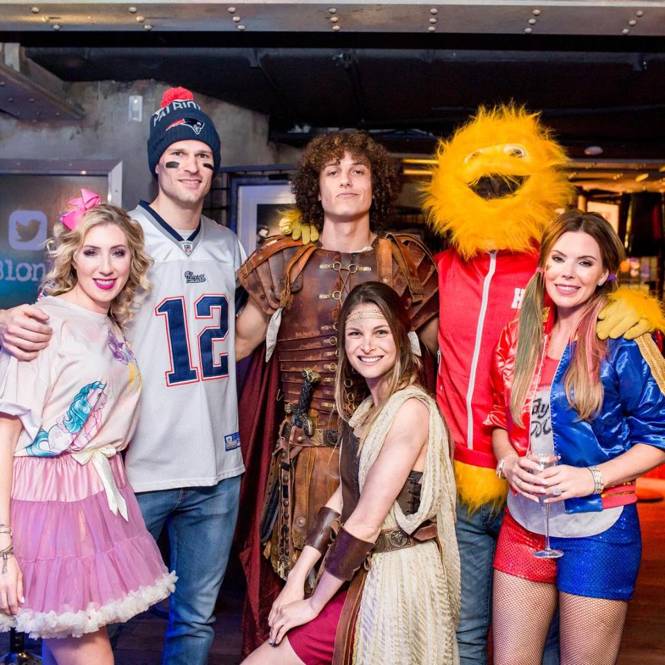  Terry poses with David Luiz, centre, and Asmir Begovic, left, and their wives while the Bosnian keeper makes a dead ringer for Tom Brady