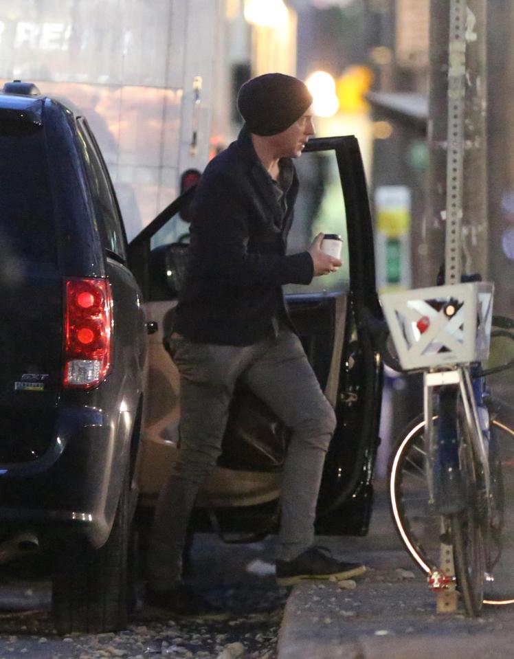  The Billions star arrives at the set of Run This Town in Toronto, Canada, wearing a black hoodie and beanie hat this week