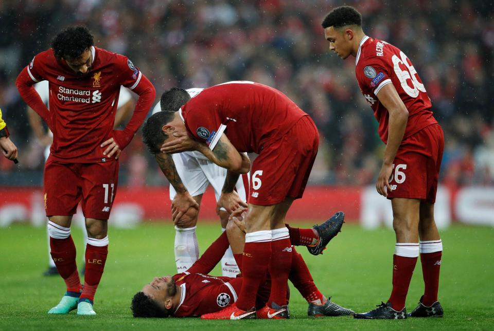  There was great concern when Alex Oxlade-Chamberlain went down with what looked like an apparent knee injury - with Dejan Lovren visibly upset