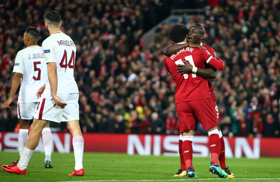  The Senegalese winger is congratulated by the unplayable Mo Salah