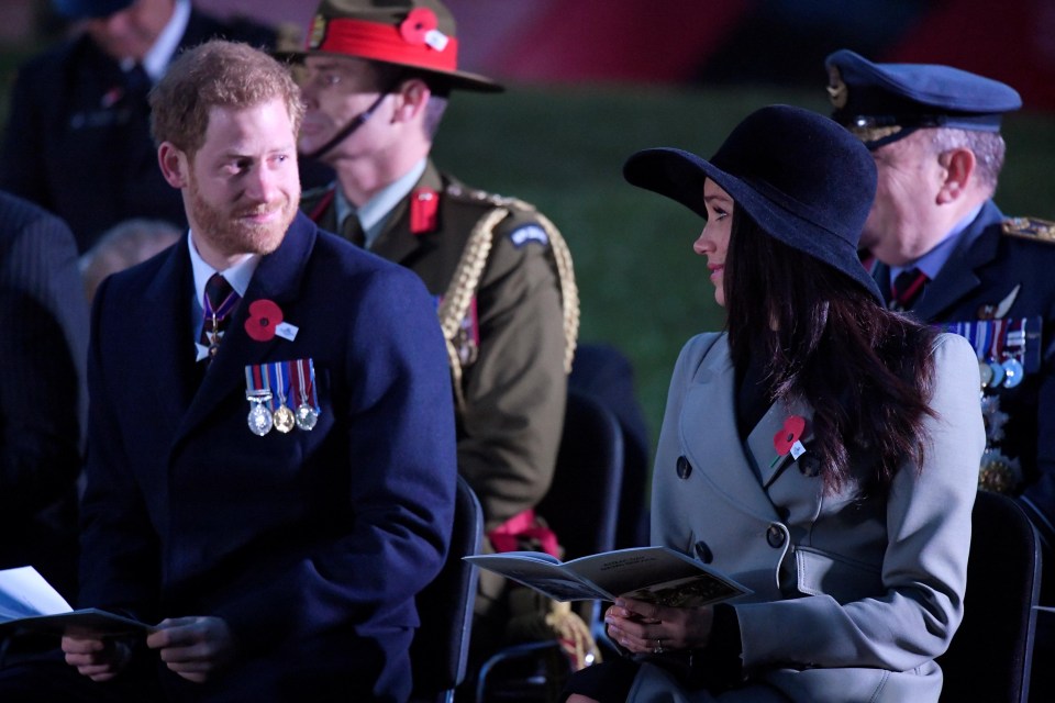 The couple shared a moment at the sombre service