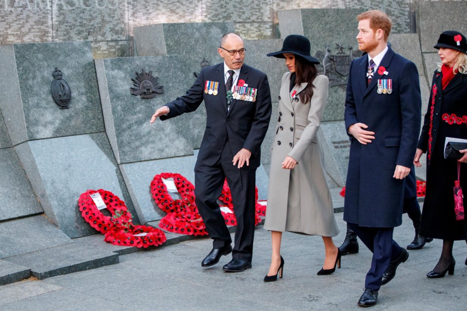 Meghan and Harry walk with New Zealand’s High Commissioner to the UK, Jerry Mateparae, during the dawn service