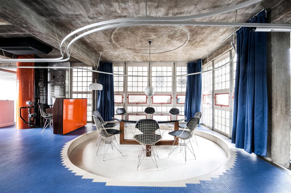  In the open plan living space there is a beautiful sunken dining area with a bespoke circular dining table