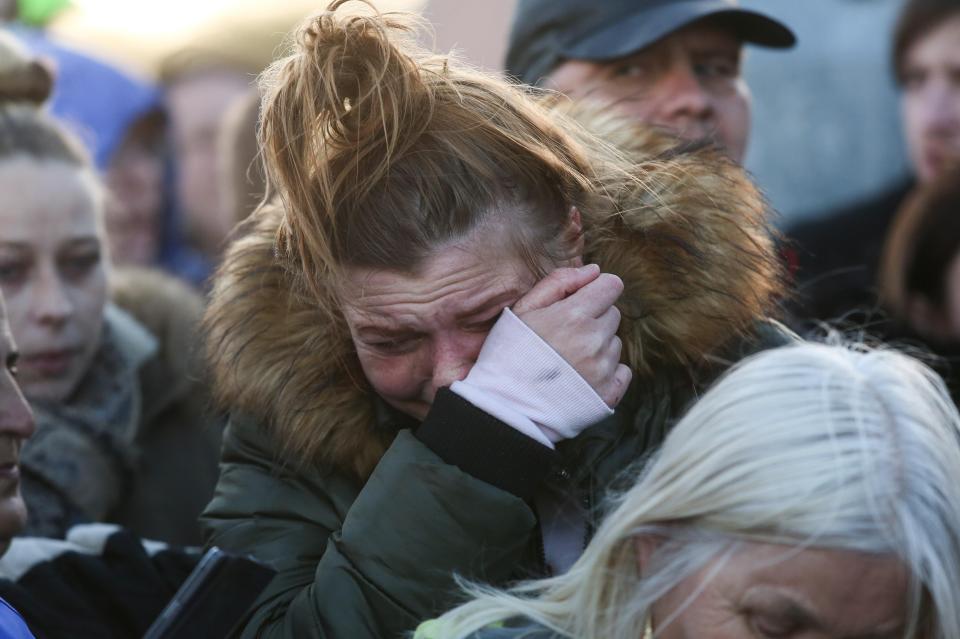  A weeping woman outside Alder Hey last night after the Appeal Court rejected a plea to take the tot to Italy