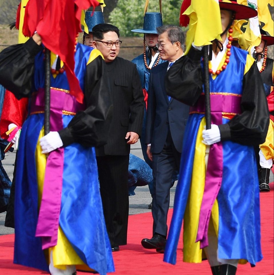  Kim was greeted by a sea of colour as he met with the South Korean President on the other side of the border for the first time in their history as leaders