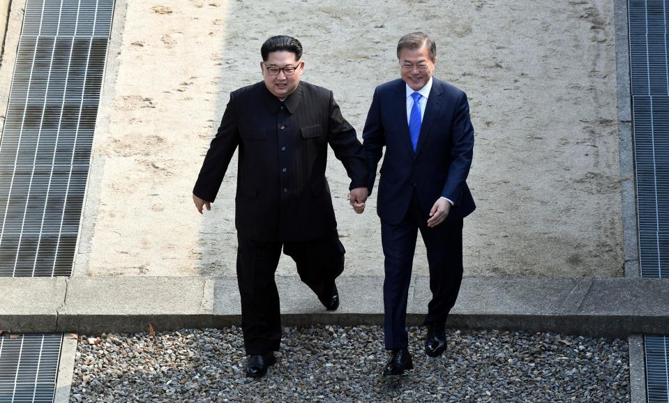  The pair signified a huge step towards peace between the warring countries as they smiled while crossing the border