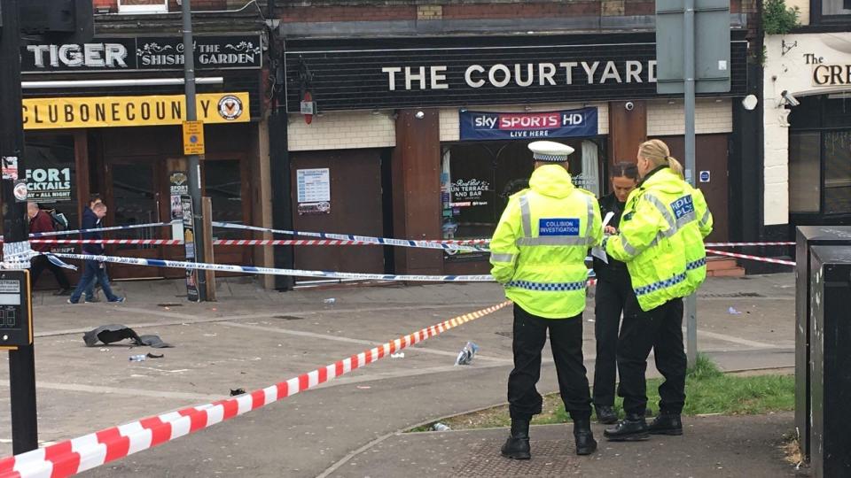  Cops are seen guarding a cordon around the scene of the incident