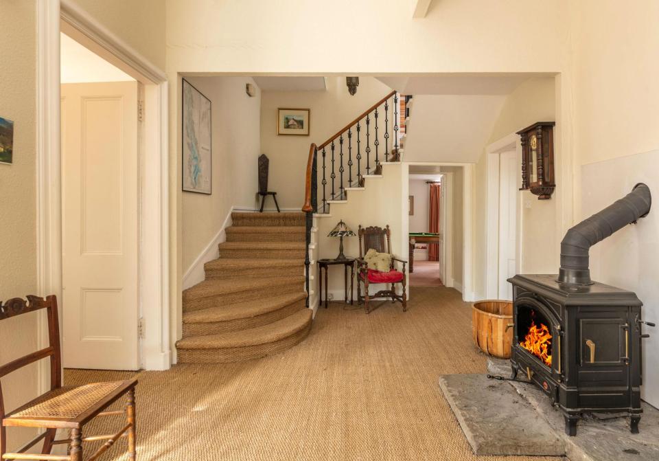  A hallway stove provides an inviting atmosphere