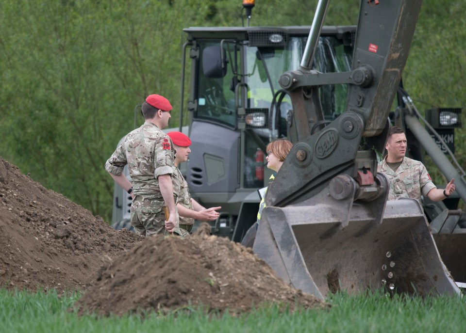 A digger was snapped removing soil where tot Katrice disappeared more than 30 years ago