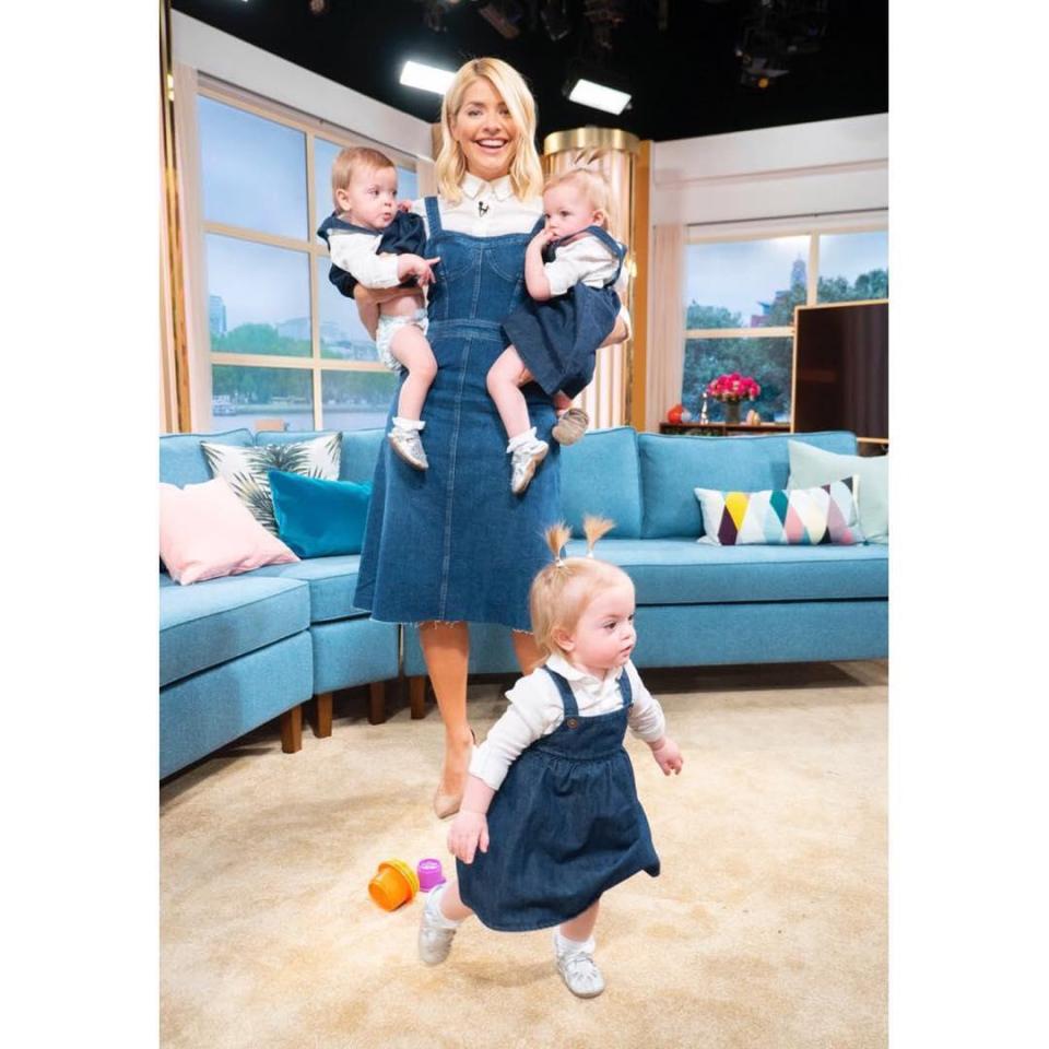  Birmingham triplets Amelie, Maya-Albertine and Etta Wooldridge dressed to look like presenter Holly Willoughby