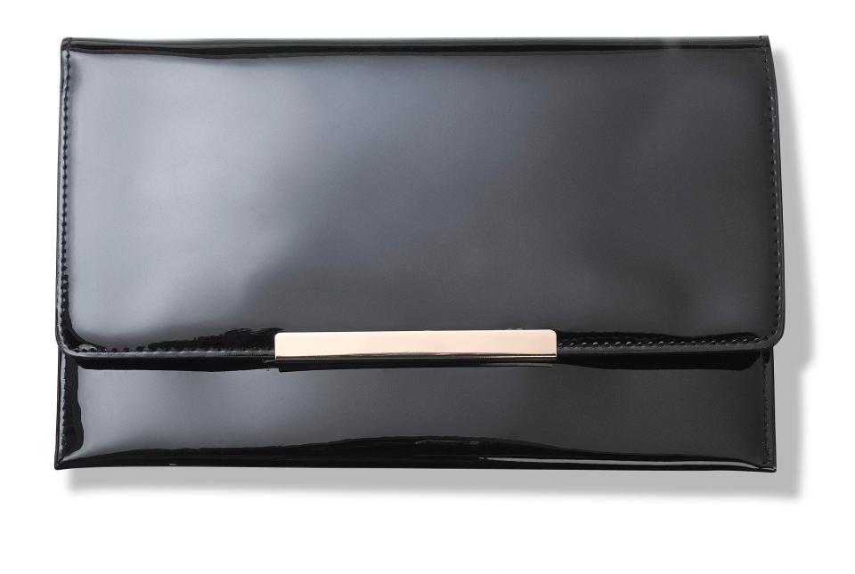  A chic clutch keeps your outfit classy