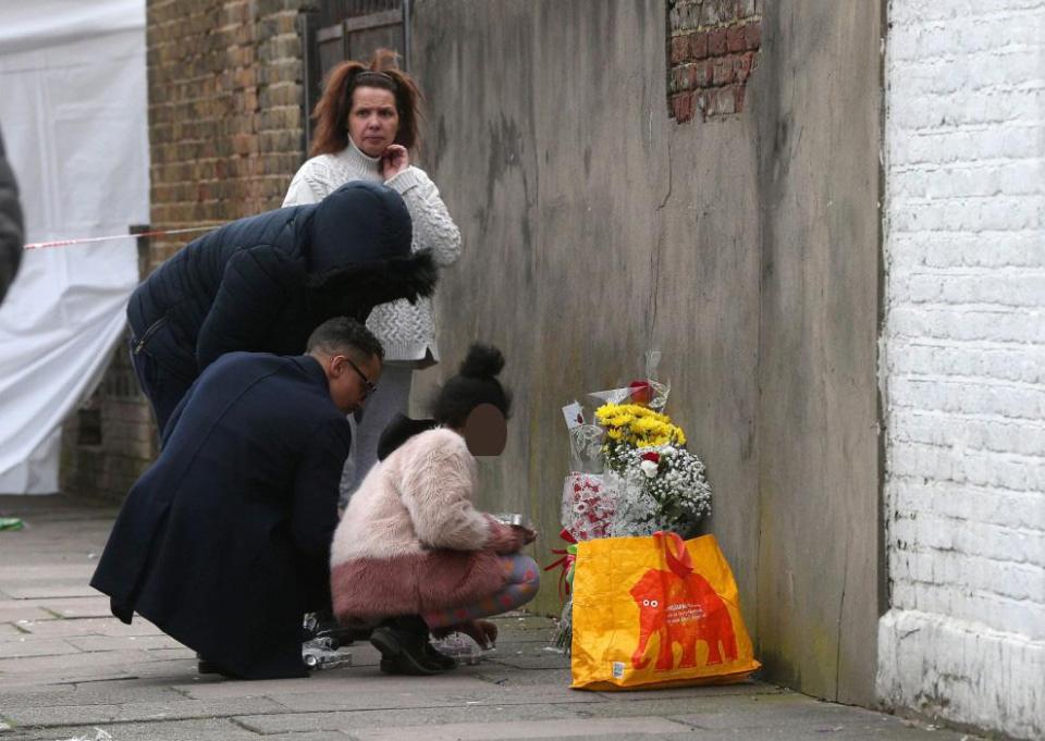  Floral tributes have been left at the scene where the teen was gunned down in a drive-by shooting