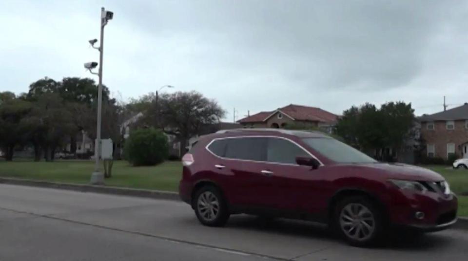  The pick-up truck's registration gets picked up by the camera when another car drives over the 35mph speed limit