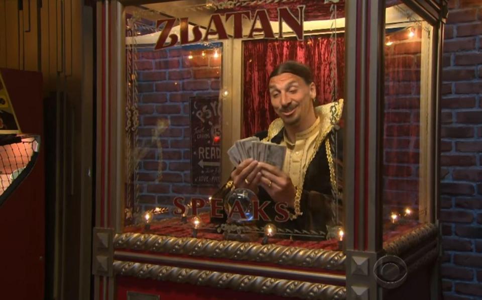  Zlatan grins after duping Corden out of a fist full of dollars