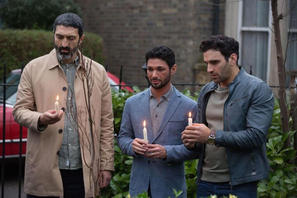  Shakil's dad and brother Darius arrive in Walford to mourn for him