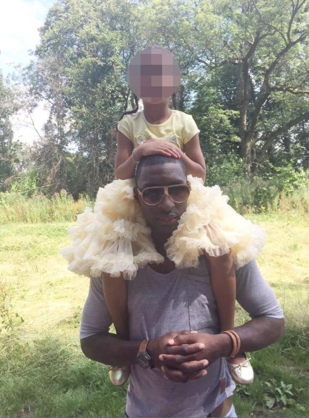  Jlloyd Samuel poses proudly with daughter Amara