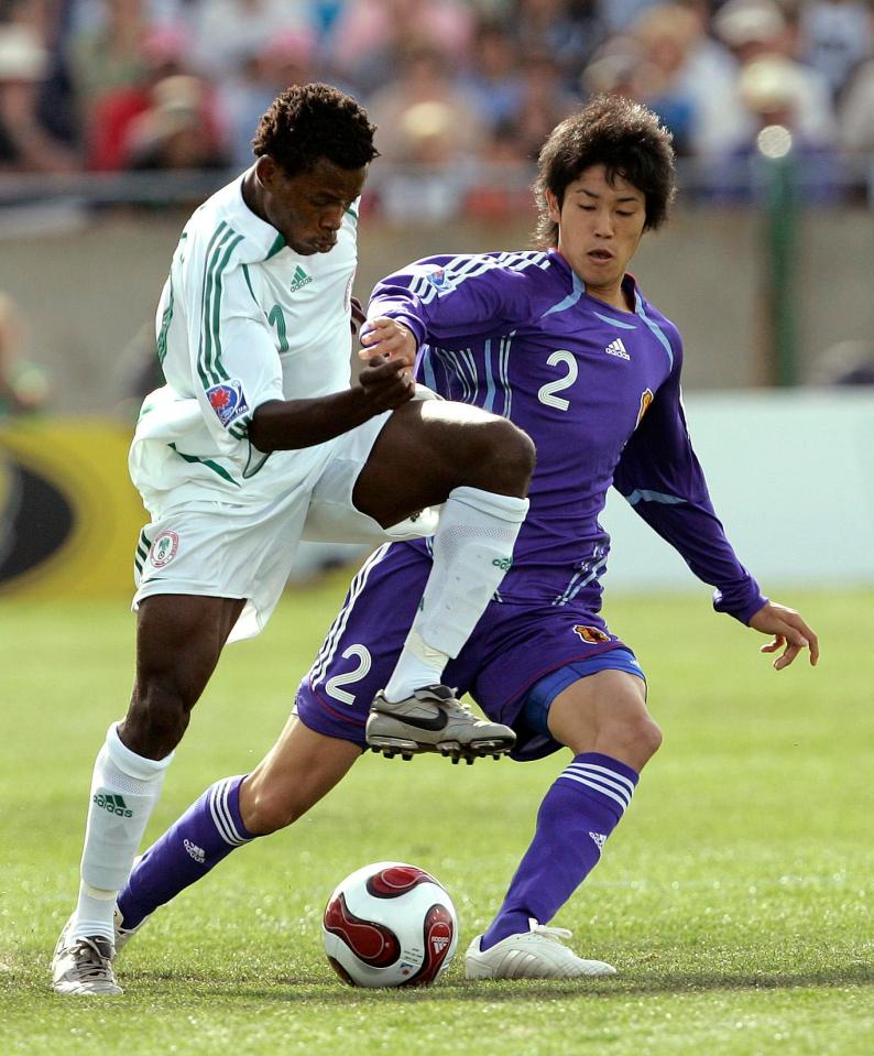  Atsuto Uchida shows off a typical Japanese hair style