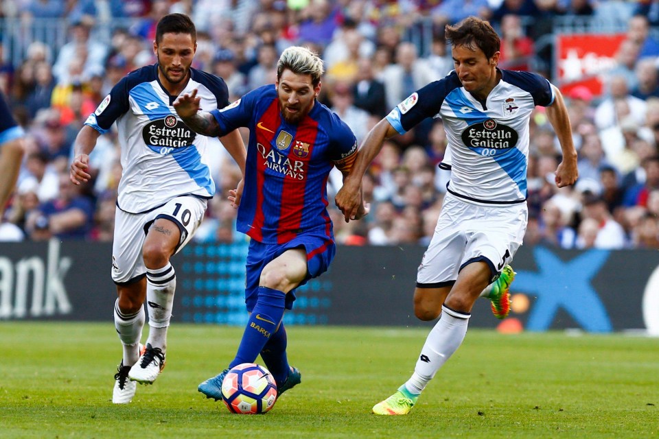 Florin Andone, left, in action with Barcelona star Lionel Messi