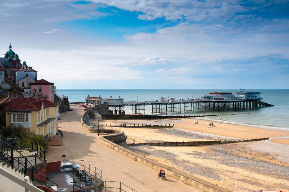  Cromer has a pier for exploring as well as clean water and golden sands