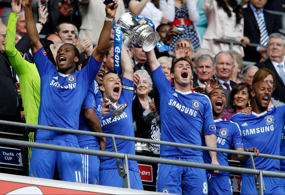  Chelsea skipper John Terry and Frank Lampard lift the FA Cup trophy after victory over Portsmouth in 2010