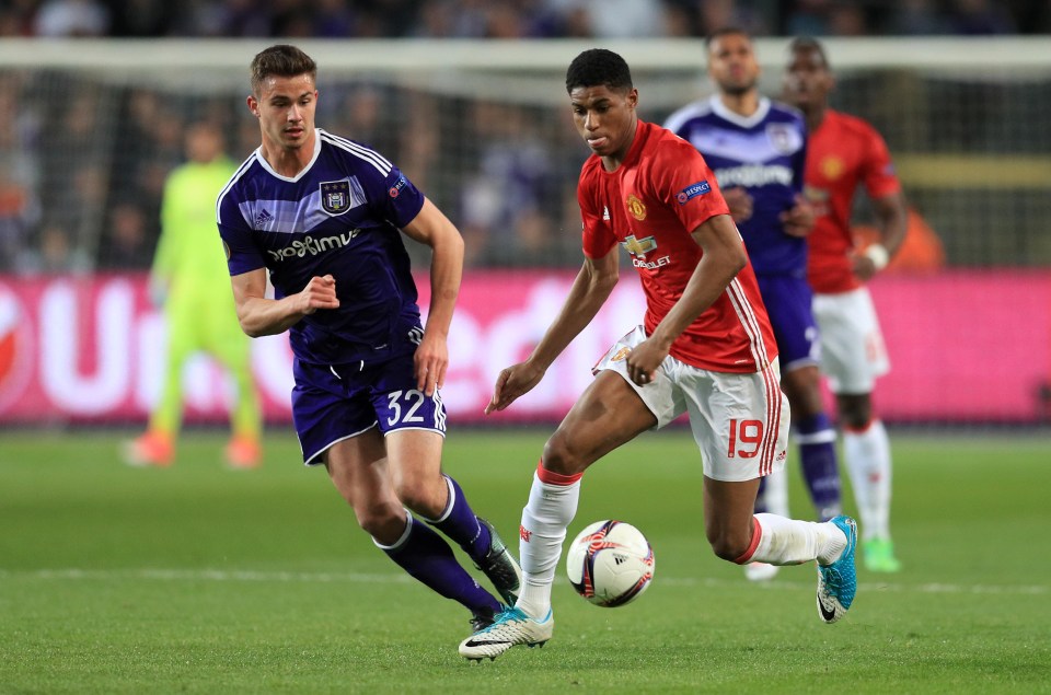 Anderlecht’s Leander Dendoncker takes on Manchester United’s Marcus Rashford