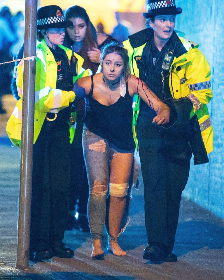  Terror attack survivors are calling on the public to help them combat extremism - pictured wounded people on Hunts Bank outside Victoria Station and the stairs leading to the Manchester Arena