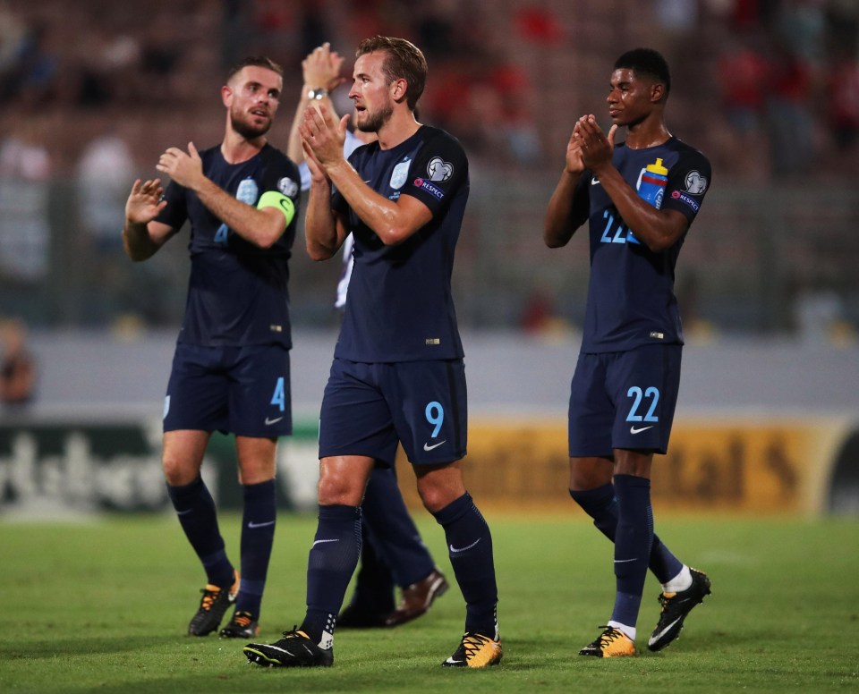 Henderson with Harry Kane and Marcus Rashford after a win over Slovenia 