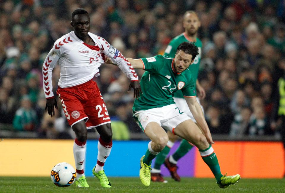  Denmark's Pione Sisto holds off Ireland's Harry Arter