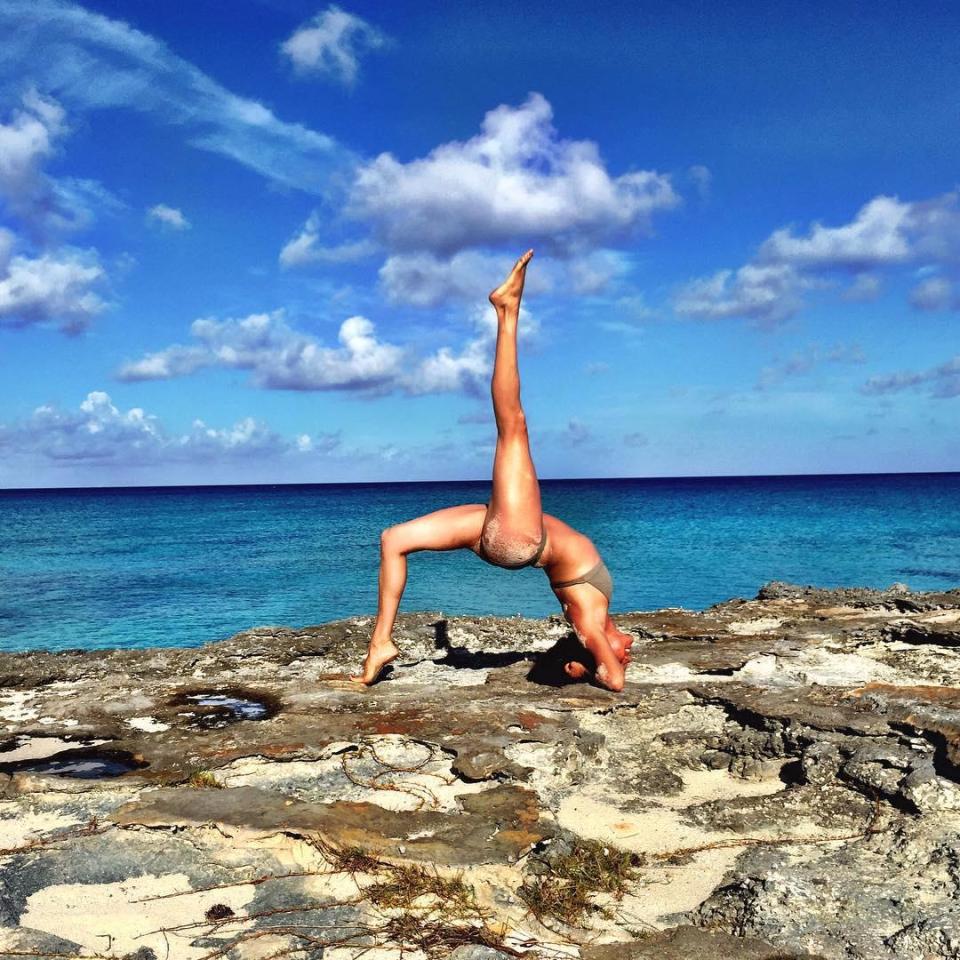  Meghan makes a difficult yoga pose look easy on this picture from her now-deleted Instagram account