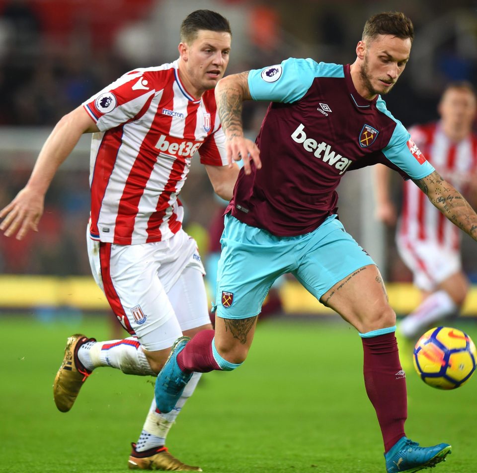  Kevin Wimmer tries to get to grips with West Ham's Marko Arnautovic in December