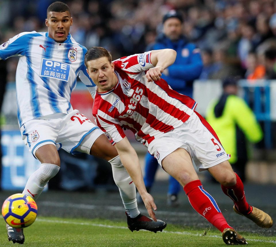  Wimmer tussles with Huddersfield Town's Collin Quaner