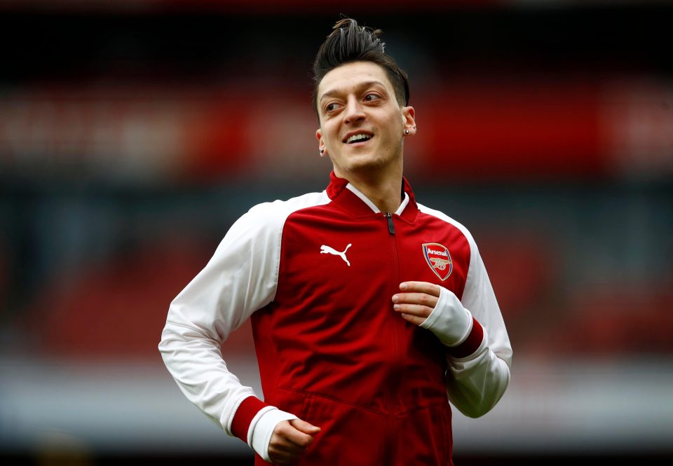  Ozil has ruled himself out for the rest of the season with a back injury