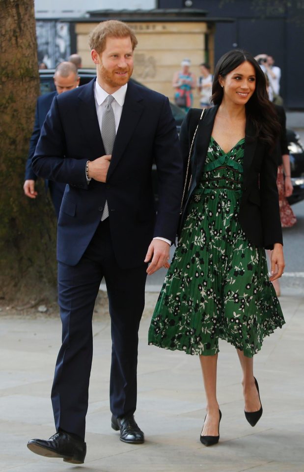  Prince Harry and Meghan Markle attend the Invictus Games Reception at Australia House on April 21, 2018