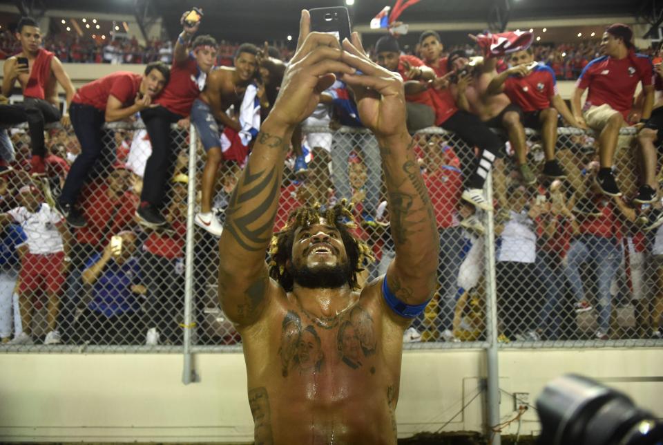  Roman Torres takes a selfie with celebrating Panama fans