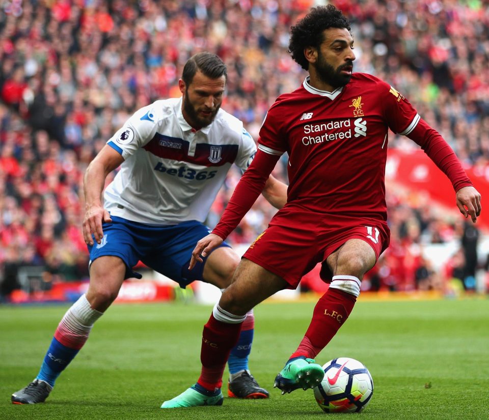  Mo Salah on the ball, carefully watched by Wimmer