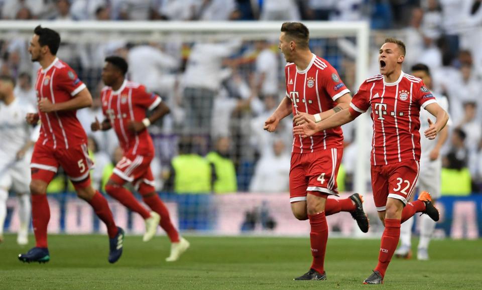  Joshua Kimmich celebrates with Bayern Munich team-mates after opener