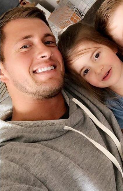 Dan Osborne didn't mention the split but instead posed up with his two kids 