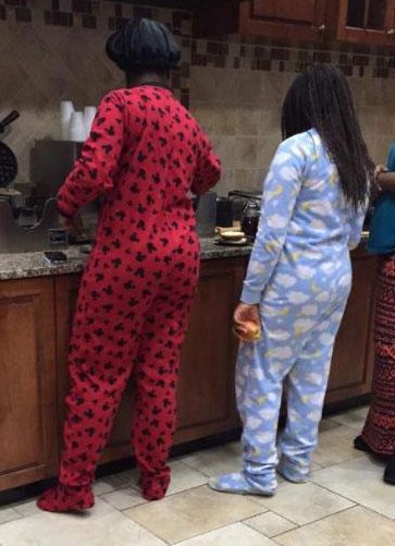  Instead of throwing on a pair of shorts and a T-shirt, these holidaymakers are helping themselves to the self-serve buffet in flannel pjs