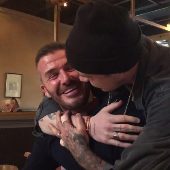  David Beckham looks overjoyed as son Brooklyn surprises him in London on his birthday