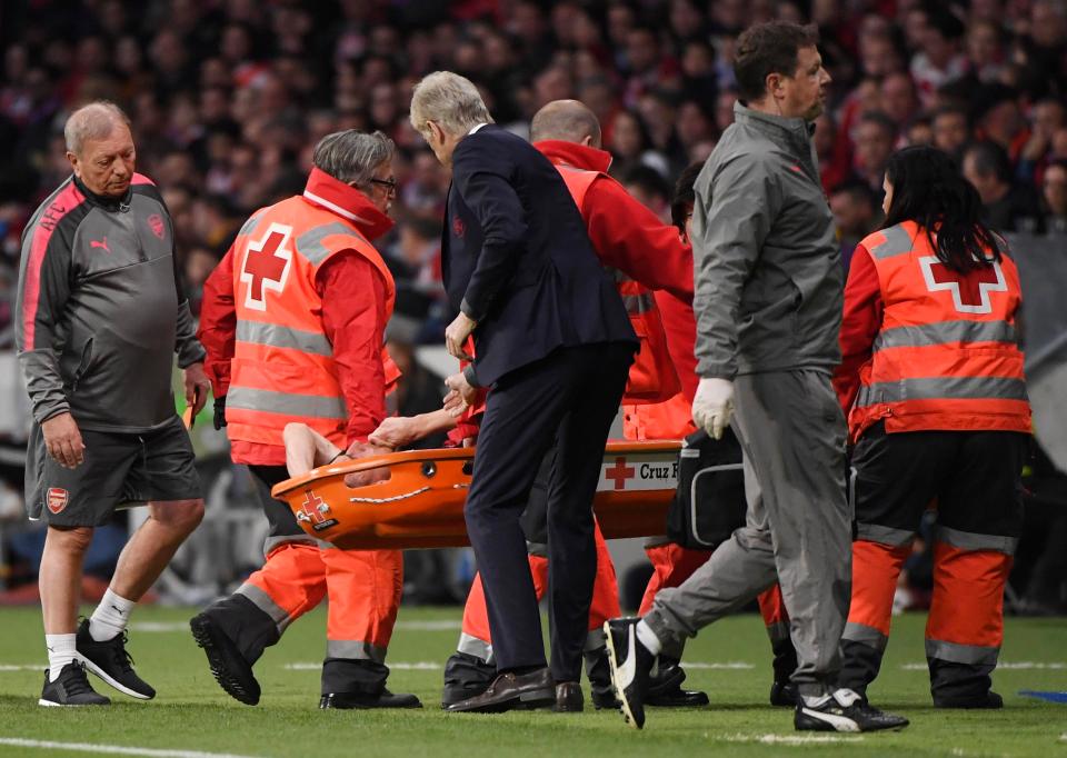  Arsenal defender Laurent Koscielny was carried off on a stretcher during Atletico Madrid defeat