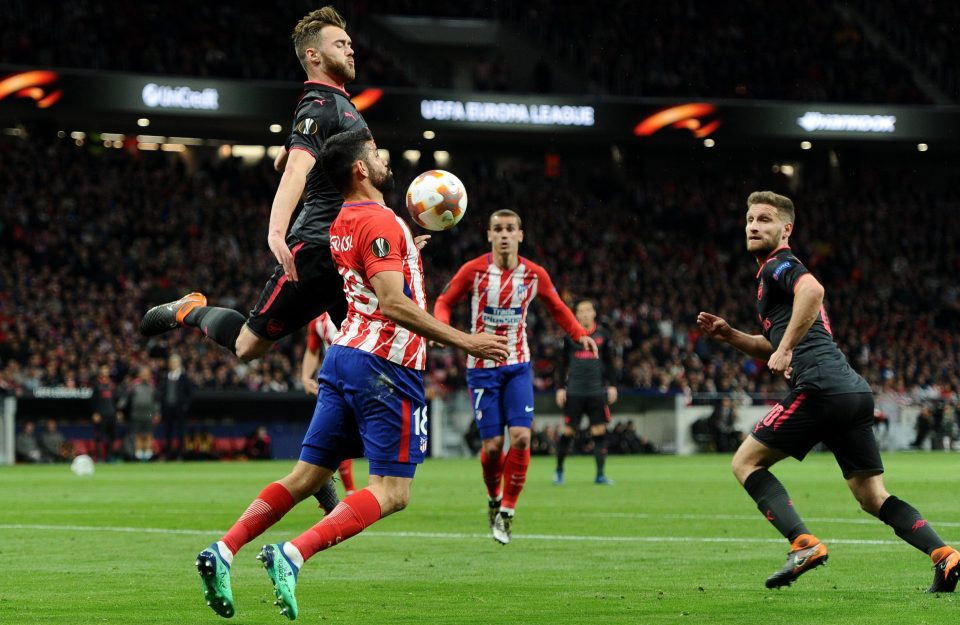  Diego Costa holds off Calum Chambers as he challenges for the ball