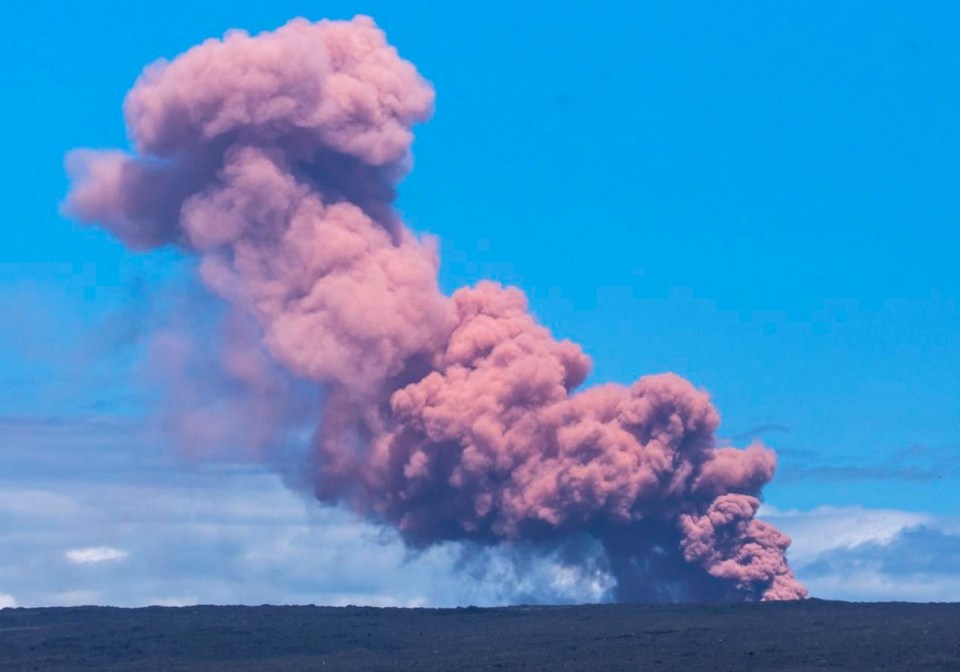 A cloud of ash rises over Kilauea volcano in Hawaii as it erupted in May 2018