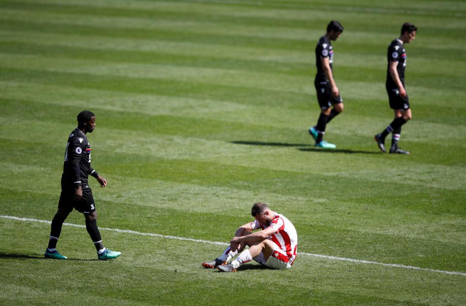  Erik Pieters dropped to the floor as the full time whistle blew at the bet365 Stadium