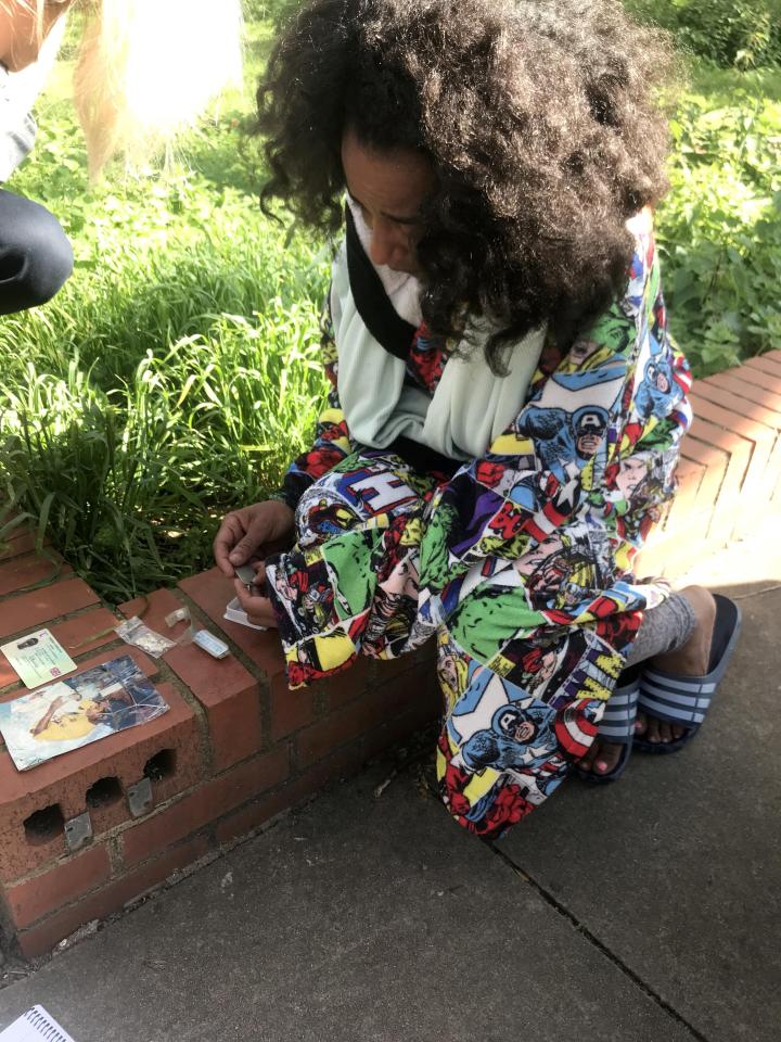  Distraught mother Pretana Morgan, 38, displays some mementos of her dead son